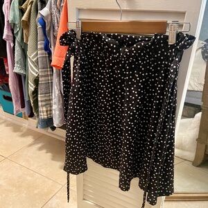 Black skirt with white hearts all over